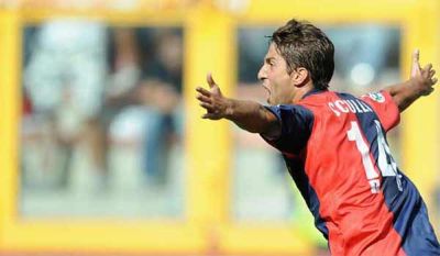 Giuseppe Sculli celebrates his goal against Milan