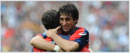 Diego Milito celebrates one of his many goals with Giuseppe Sculli