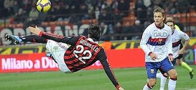 Marco Borriello (in off-side position) scores against his former team Genoa