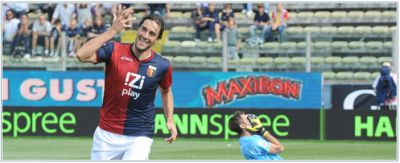 Luca Toni celebrates his first goal with Genoa